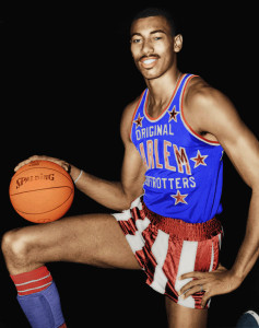 Wilt Chamberlain as a member of the Harlem Globetrotters. Fair use image via wikimedia.